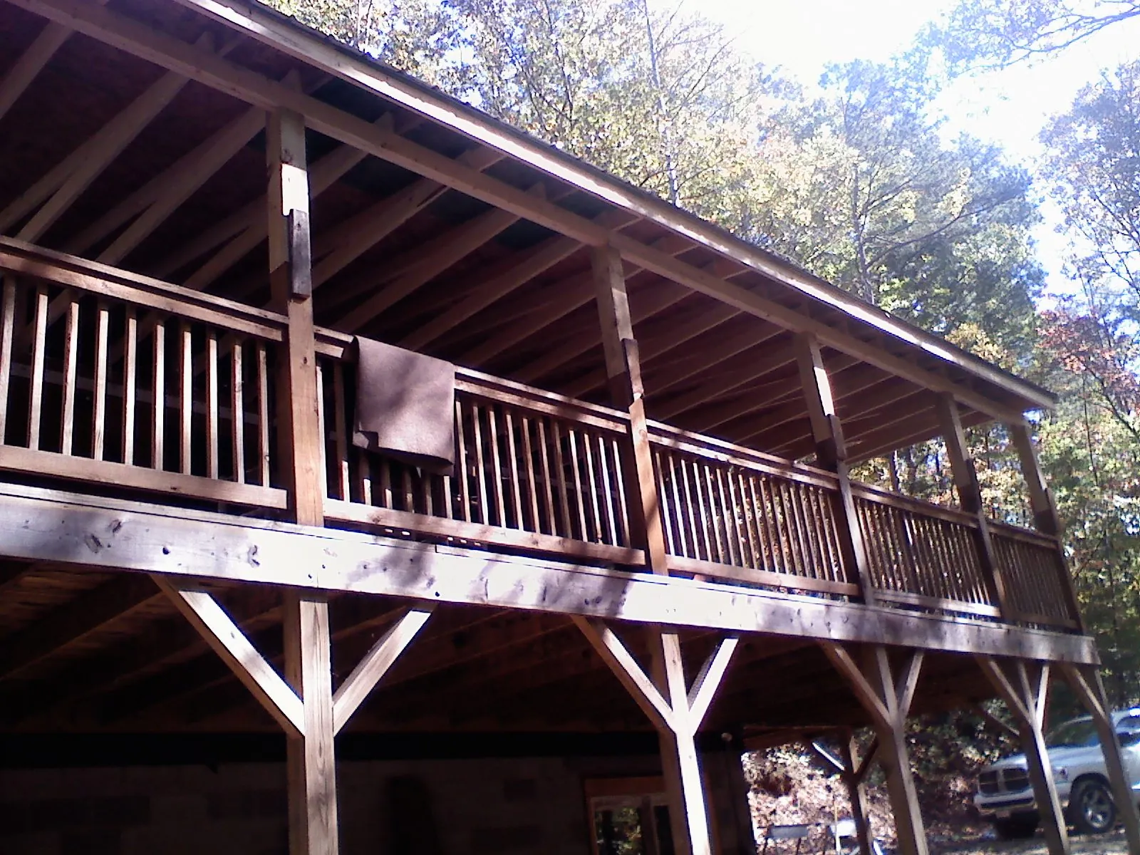 Timber framing under a new elevated porch and deck — Roof Leak Repair in Sulphur Springs by Roofing Brothers